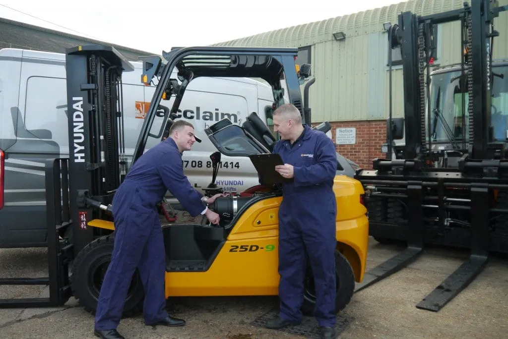 Acclaim Handling engineers checking a forklift