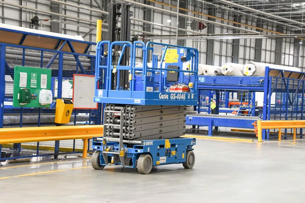 Genie scissor lift in a warehouse