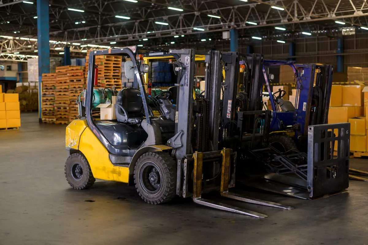 Forklift loader in warehouse